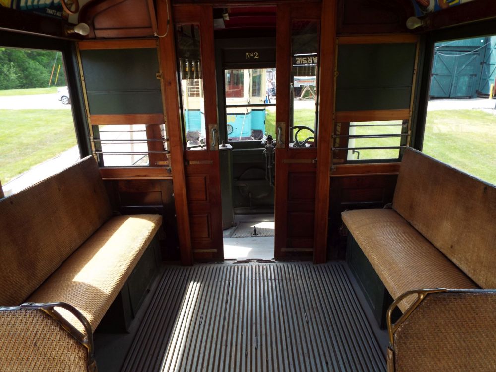 Red Brooklyn Trolley end seats and door