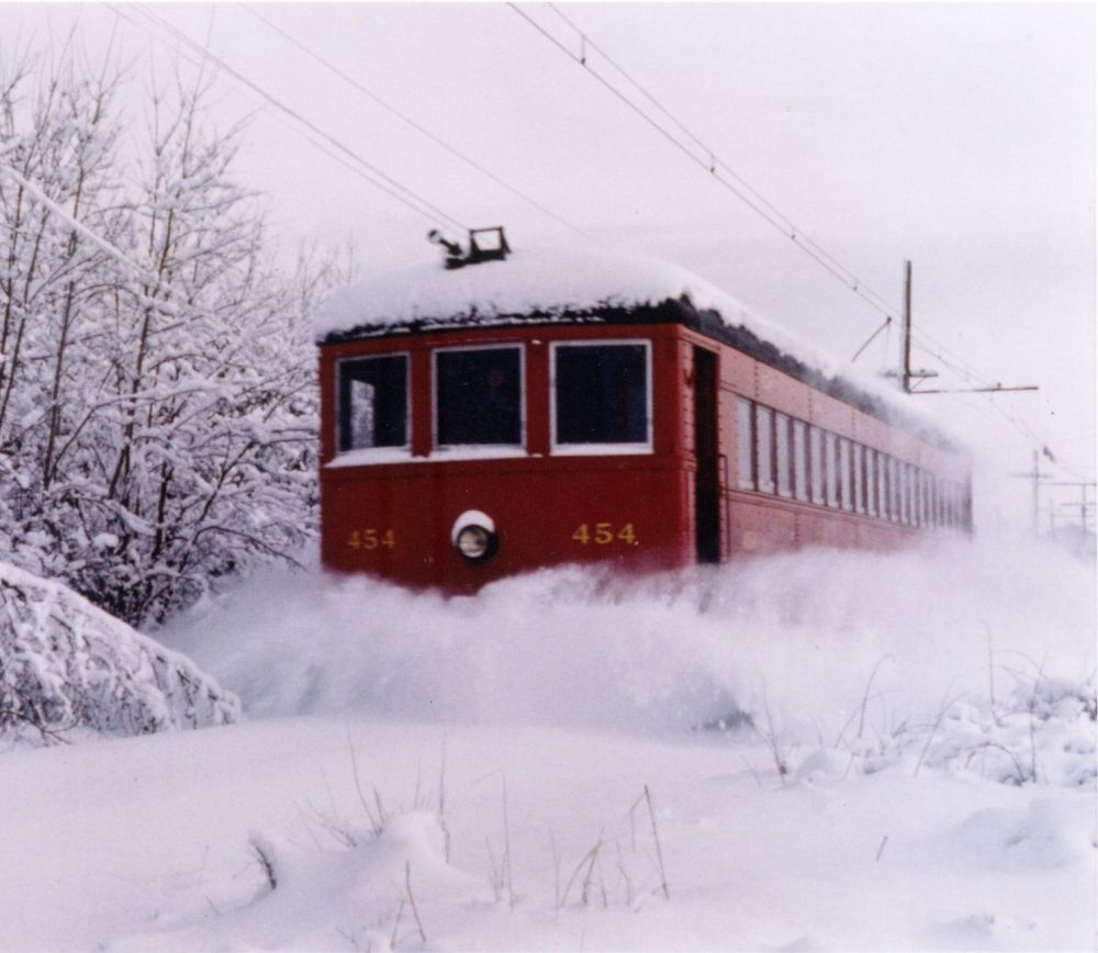 Red Trolley 454 plowing snow