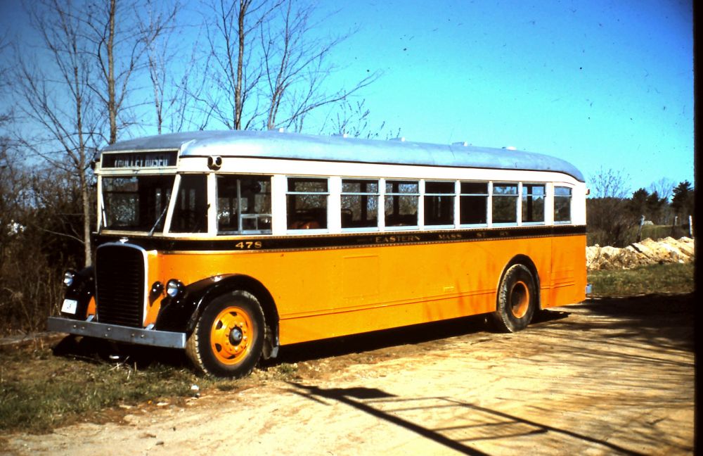 Antique orange bus 478